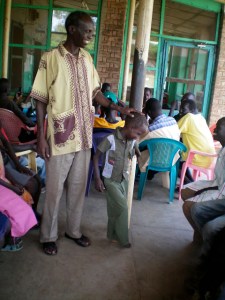 Juab Orphanage Director Abdul Wajo sharing a moment with one of the children