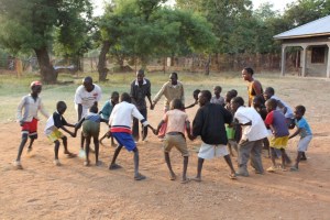 Sienna and Ellie play games with the children